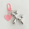 Girls' pink balloon dog keychain toy